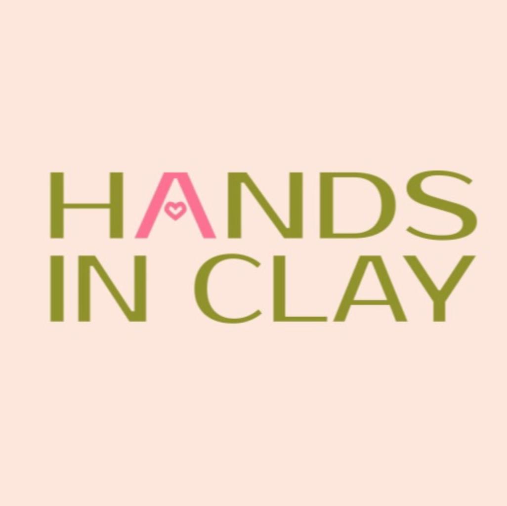 Hands in clay