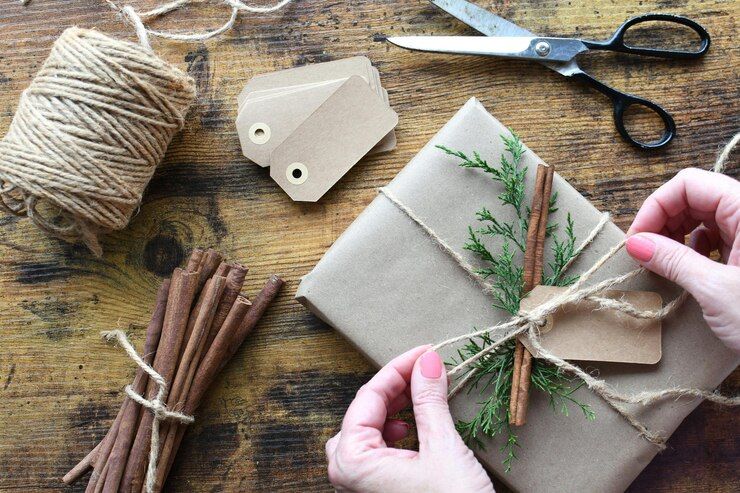 a-person-tying-a-gift-wrapped-in-brown-paper-with-twine-and-twine_860247-4072.jpg
