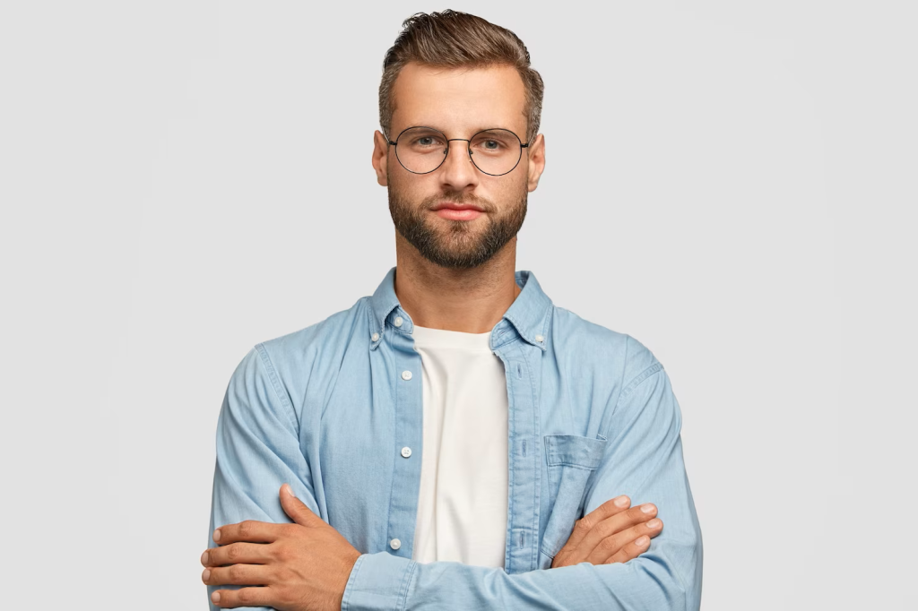 handsome-bearded-guy-posing-against-white-wall_273609-20597.png
