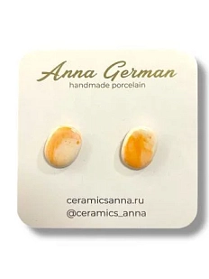 Серёжки-гвоздики Анна Герман «Овал с акварельными брызгами», фарфор, бело-оранжевые