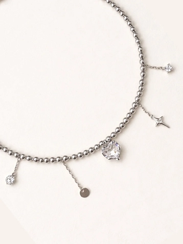 Чокер Мигетт «Сердечко, звездочка, шар», из тёмного гематита с подвесками, фото 1.