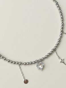 Чокер из тёмного гематита с подвесками «Сердечко, звездочка, шар» Migette