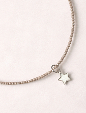 Чокер Мигетт «Звёздочка» из мелкой бежевой шпинели с подвеской