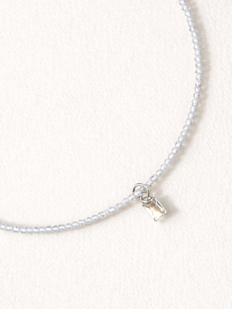 Чокер из белого циркона с прямоугольным сияющим камнем Migette