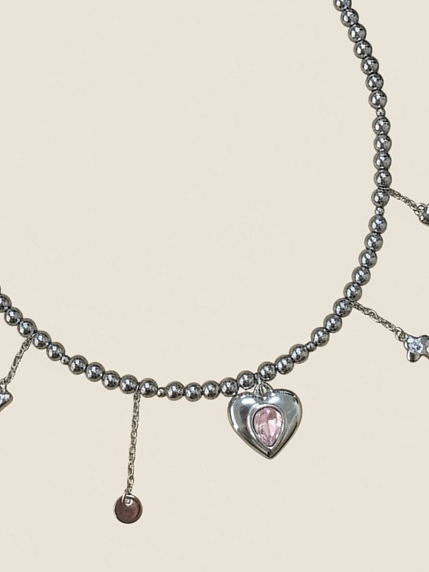 Чокер из тёмного гематита с подвесками «Сердечко с розовым камнем» Migette, фото 1.
