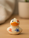 Керамическая фигурка Утёнок с разноцветными цветочками, 4 см, превью фото 3