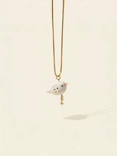 Подвеска ручной работы Hands in clay с птичкой, золотистая, фарфор